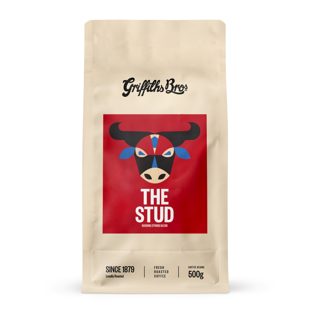Griffiths Bros coffee package with a red label featuring a bull graphic on a beige background
